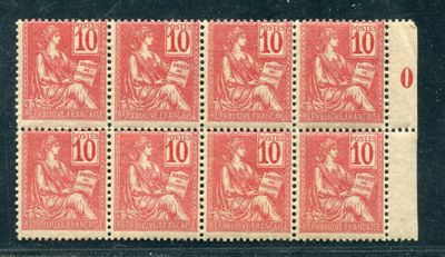 a red and white stamp with a picture of a woman on it