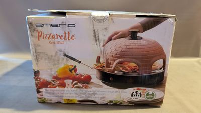 emballage d'un four à pizza posé sur une table