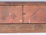 a wooden box with writing on it and a wooden box with writing on it