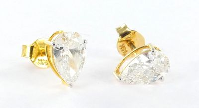 pair of diamond stud earrings on a white background