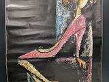 une image représentant un tableau où l'on voit une femme assise sur une table