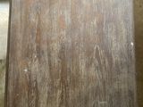 a picture of a piece of wood with a price tag on it