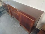 an image of a very nice looking wooden sideboard