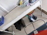 a small table with a bunch of books on top of it