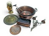 a lot of metal items that are on a white surface