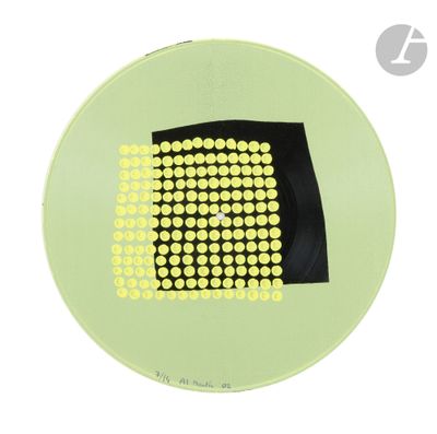 a picture of a green plate with yellow dots on it