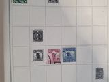 a picture of a chinese calendar with stamps on it