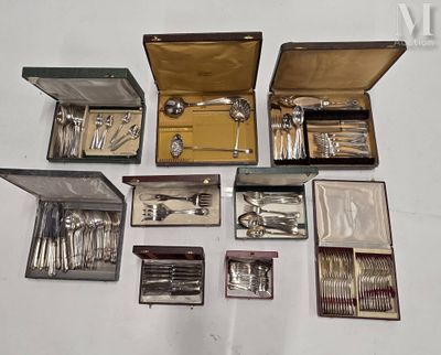 many different types of silverware in a case
