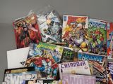 a lot of comic books sitting on a table