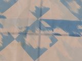 a blue and white checkered pattern on a table cloth