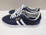 men ' s navy and white sneakers with white stripes on the sole