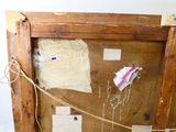 une photo d'une œuvre d'art accrochée au mur