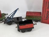 three toy trains sitting next to each other on a table