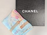 chanel silk scarf in blue and pink with a black box