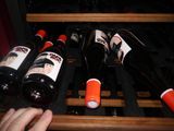 many bottles of wine that are in a wine cooler