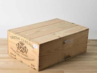 a wooden box that is sitting on a wooden floor