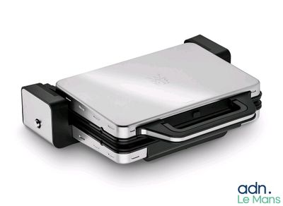 a laptop that is sitting on top of a stand
