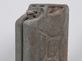 an old metal canister with a metal handle on a white background
