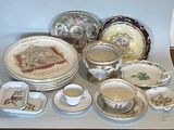 a lot of plates and cups on the table