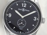 a close up of a wrist watch with a black dial