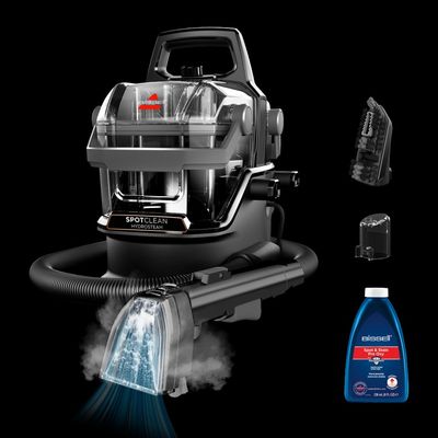 the hoover vacuum cleaner is being used to clean the carpet