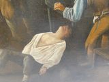un tableau représentant un homme à genoux, une épée à la main