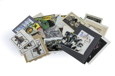 a pile of books with pictures on them on a white surface