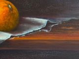 a painting of an orange on a piece of paper