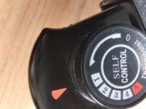 a close up of a camera on a wooden table