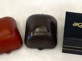 two chocolates that are next to each other on a table