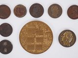 an image of a collection of coins including a penny, a penny, a penny, a penny, a penny, a penny, and a penny