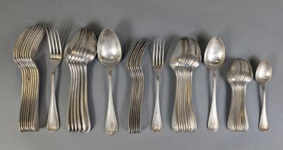 five spoons and six spoons sitting on a table