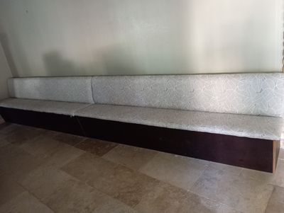 a couch that is sitting in the corner of a room