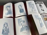 several pages of a book with a picture of a man and a woman on them