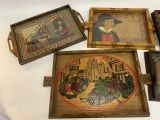four framed pictures on a table with a picture of a man in a hat