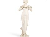 statue of a woman holding a bouquet of flowers on a white background