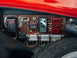 a close up of a car ' s dashboard with a lot of wires on it