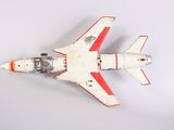 a toy airplane that is sitting on a white surface