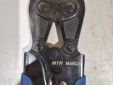 a pair of pliers that are sitting on a table