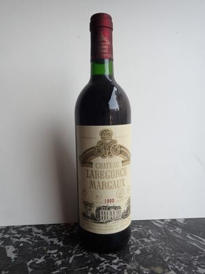 a bottle of wine that is sitting on a table