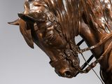bronze statue of a horse with a bridle and bridle on it ' s head