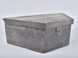 an old metal box with a lock on it