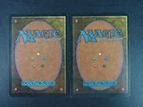 two decks of magic the gathering deck are shown on a table