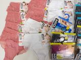 several pairs of underwear are laid out on a table