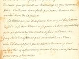 un gros plan d'un morceau de papier sur lequel on a écrit