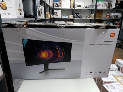 an image of a computer monitor sitting on top of a white table