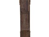 an image of a tall wooden clock tower with a clock on the top of it