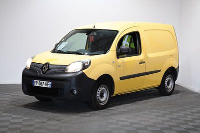 the yellow van is parked in the empty room on the checkered floor