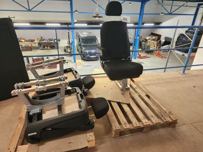 an image of a chair that is sitting on a pallet
