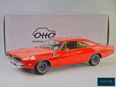 an image of a toy car is sitting in front of a box